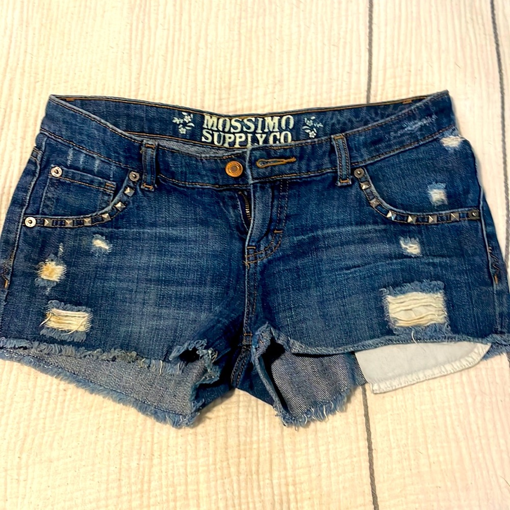 Distressed denim cutoff shorts